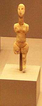 A Cycladic Statuette. Notice the elongated head.