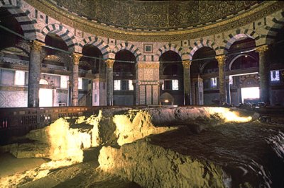 The Foundation Stone as seen from inside  the Dome of the Rock. This is where tradition attests the creation of Adam took place and where Abraham offered Isaac as a sacrifice. It is believed the Holy of Holies occupied this spot.